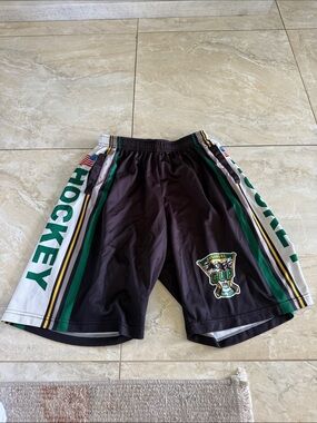 Men's Black Hockey Shorts with Green & White Accents